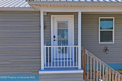 Exterior - 3270 Hibiscus Dr, Hernando Beach, FL 34607 photo 2 of 13