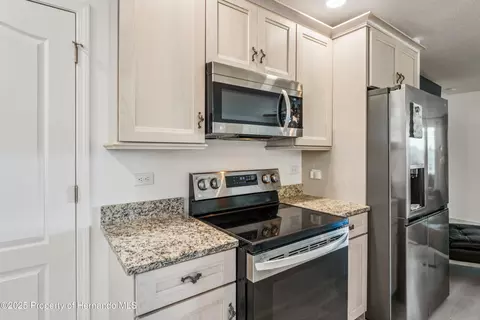Kitchen - 3270 Hibiscus Dr, Hernando Beach, FL 34607 photo 3 of 3