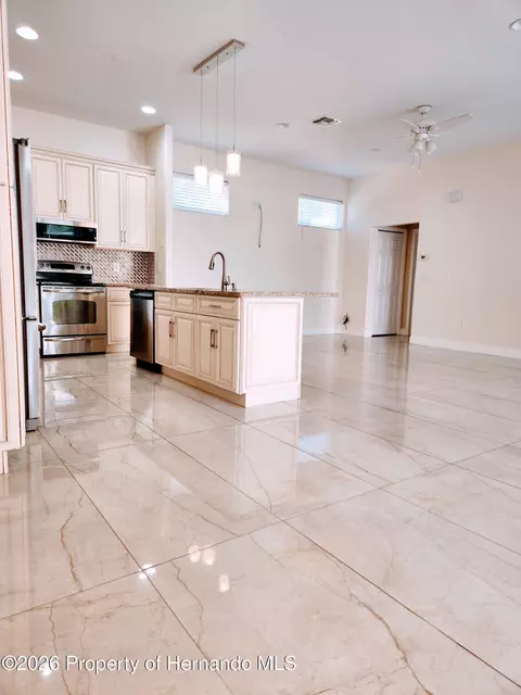 Kitchen - 7190 Raymond Pl, Spring Hill, FL 34607 photo 3 of 5
