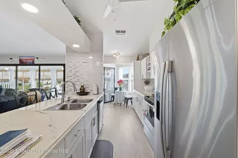 Kitchen - 3366 Bluefish Drive Dr, Hernando Beach, FL 34607 photo 8 of 9