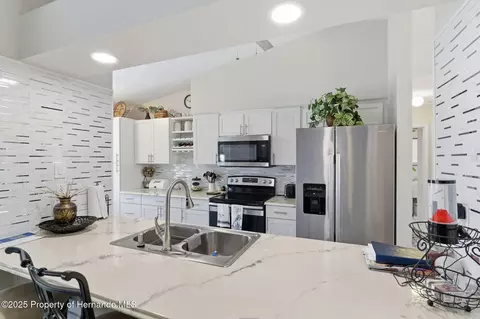 Kitchen - 3366 Bluefish Drive Dr, Hernando Beach, FL 34607 photo 2 of 9