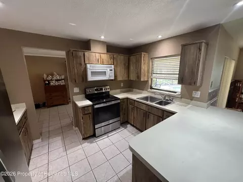 Kitchen - 2148 Waterfall Dr, Spring Hill, FL 34608 photo 1 of 3