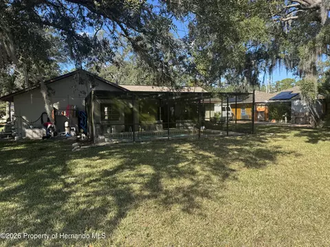 Exterior - 2148 Waterfall Dr, Spring Hill, FL 34608 photo 5 of 8