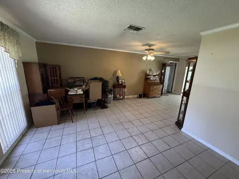 Living - 2148 Waterfall Dr, Spring Hill, FL 34608 photo 2 of 5