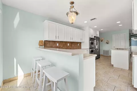 Kitchen - 3223 Hibiscus Dr, Hernando Beach, FL 34607 photo 4 of 13