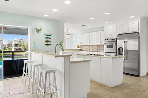 Kitchen - 3223 Hibiscus Dr, Hernando Beach, FL 34607 photo 1 of 13