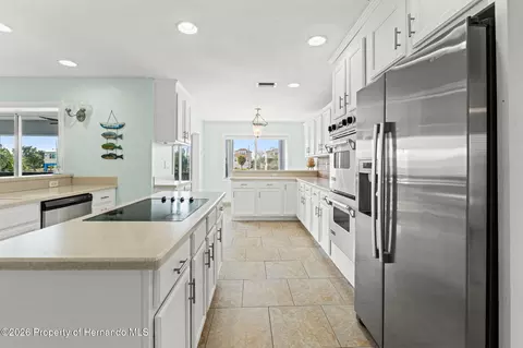 Kitchen - 3223 Hibiscus Dr, Hernando Beach, FL 34607 photo 2 of 13