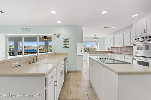 Kitchen - 3223 Hibiscus Dr, Hernando Beach, FL 34607 photo 9 of 13