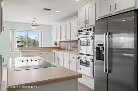 Kitchen - 3223 Hibiscus Dr, Hernando Beach, FL 34607 photo 7 of 13