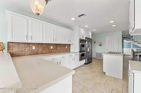 Kitchen - 3223 Hibiscus Dr, Hernando Beach, FL 34607 photo 5 of 13
