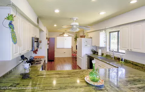 Kitchen - 6502 River Run Blvd, Weeki Wachee, FL 34607 photo 5 of 7