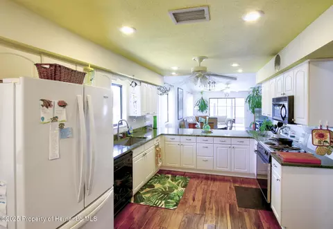 Kitchen - 6502 River Run Blvd, Weeki Wachee, FL 34607 photo 4 of 7