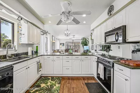 Kitchen - 6502 River Run Blvd, Weeki Wachee, FL 34607 photo 4 of 6