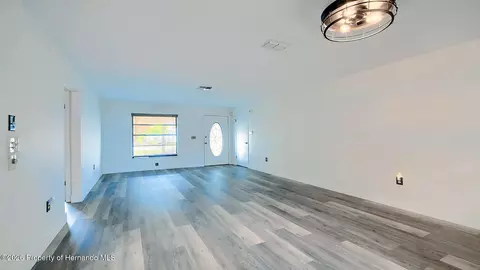 Living - 12050 Cavern Rd, Spring Hill, FL 34609 photo 12 of 16