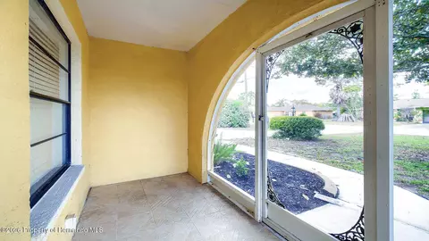 Exterior - 12050 Cavern Rd, Spring Hill, FL 34609 photo 2 of 11