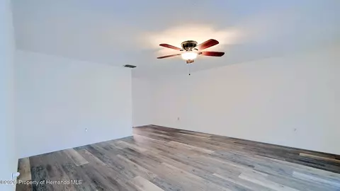 Living - 12050 Cavern Rd, Spring Hill, FL 34609 photo 5 of 16