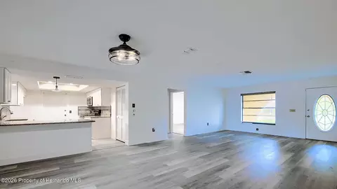 Living - 12050 Cavern Rd, Spring Hill, FL 34609 photo 4 of 16