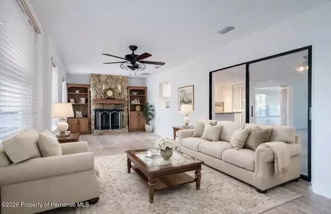 Living - 12050 Cavern Rd, Spring Hill, FL 34609 photo 1 of 16
