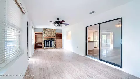 Living - 12050 Cavern Rd, Spring Hill, FL 34609 photo 2 of 16
