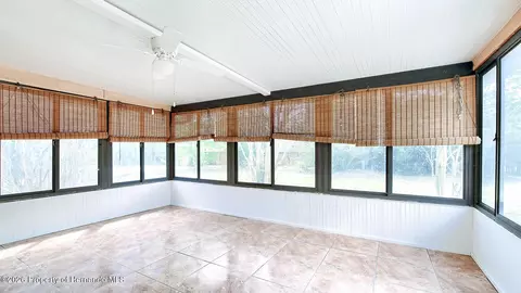 Exterior - 12050 Cavern Rd, Spring Hill, FL 34609 photo 4 of 11