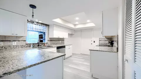 Kitchen - 12050 Cavern Rd, Spring Hill, FL 34609 photo 2 of 3