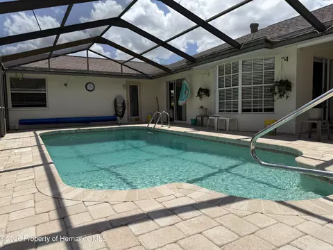 Exterior - 10381 Sandtrap Dr, Spring Hill, FL 34608 photo 8 of 11