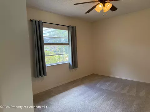 Bedroom - 10381 Sandtrap Dr, Spring Hill, FL 34608 photo 2 of 3