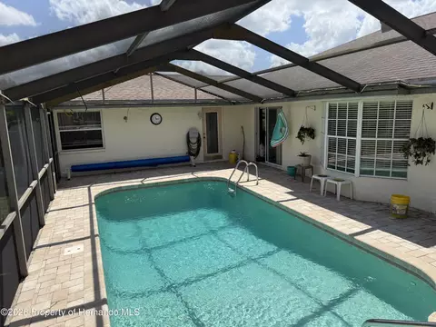 Exterior - 10381 Sandtrap Dr, Spring Hill, FL 34608 photo 7 of 11
