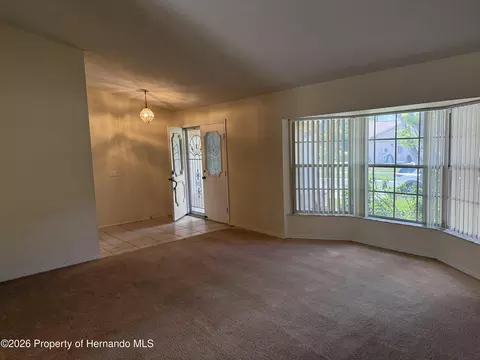 Living - 10381 Sandtrap Dr, Spring Hill, FL 34608 photo 1 of 2
