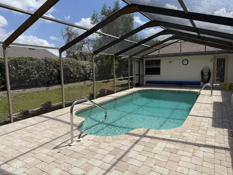 Exterior - 10381 Sandtrap Dr, Spring Hill, FL 34608 photo 10 of 11