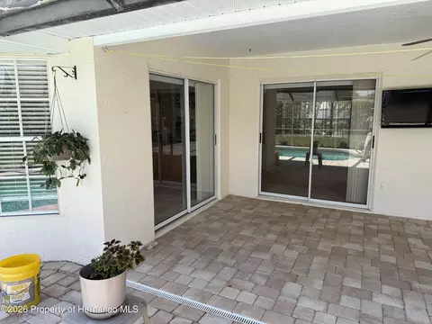 Exterior - 10381 Sandtrap Dr, Spring Hill, FL 34608 photo 4 of 11