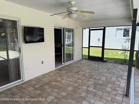 Exterior - 10381 Sandtrap Dr, Spring Hill, FL 34608 photo 5 of 11