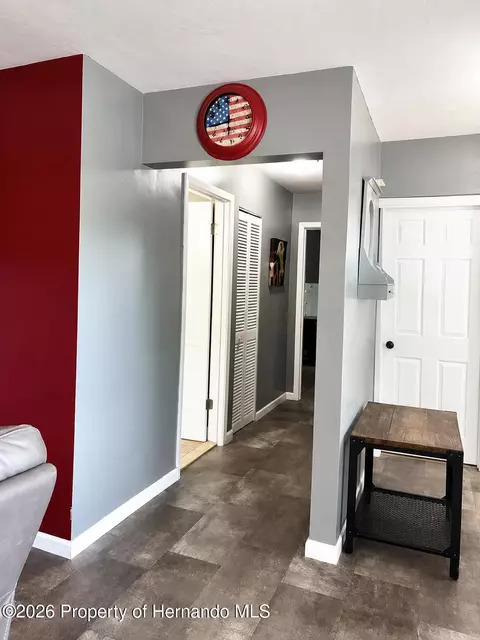 Entry Way - 7670 Pinehurst Dr, Spring Hill, FL 34606 photo 1 of 2
