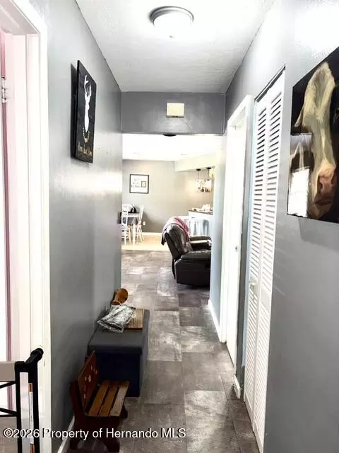 Entry Way - 7670 Pinehurst Dr, Spring Hill, FL 34606 photo 2 of 2