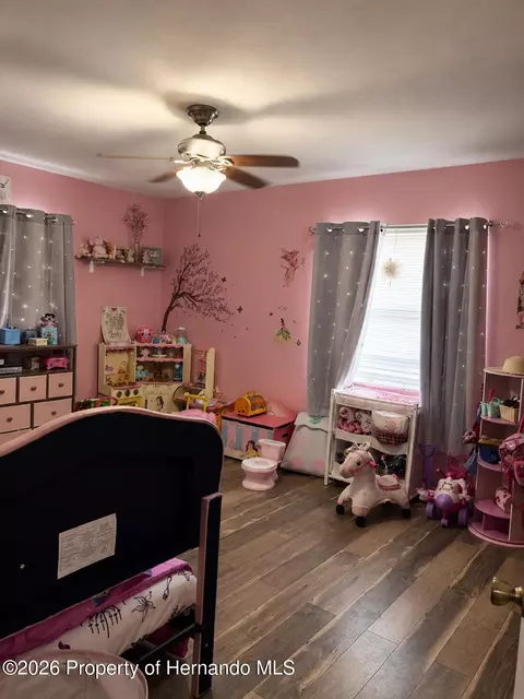 Bedroom - 7670 Pinehurst Dr, Spring Hill, FL 34606 photo 2 of 2