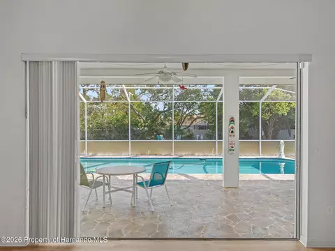 Exterior - 11344 Rainbow Woods Loop, Spring Hill, FL 34609 photo 9 of 25
