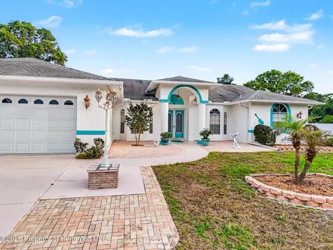 Exterior - 11344 Rainbow Woods Loop, Spring Hill, FL 34609 photo 5 of 25