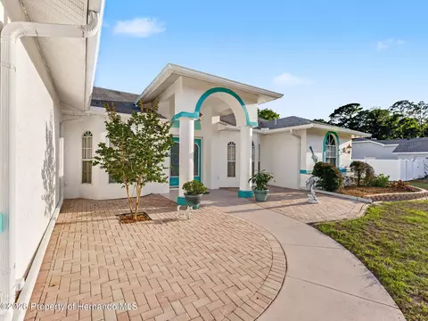 Exterior - 11344 Rainbow Woods Loop, Spring Hill, FL 34609 photo 6 of 25