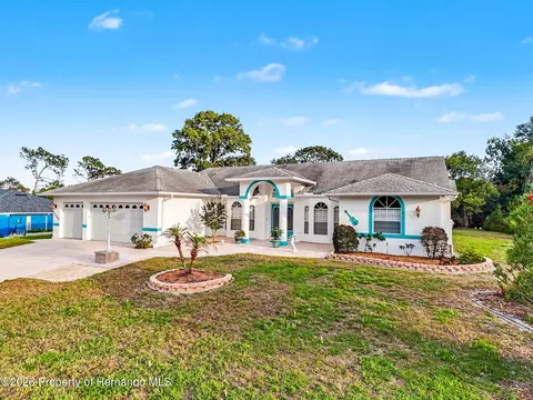 Exterior - 11344 Rainbow Woods Loop, Spring Hill, FL 34609 photo 3 of 25