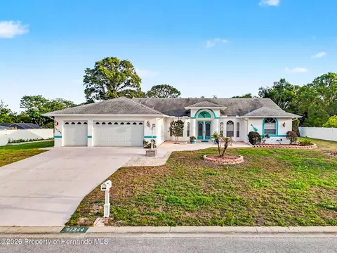 Exterior - 11344 Rainbow Woods Loop, Spring Hill, FL 34609 photo 2 of 25