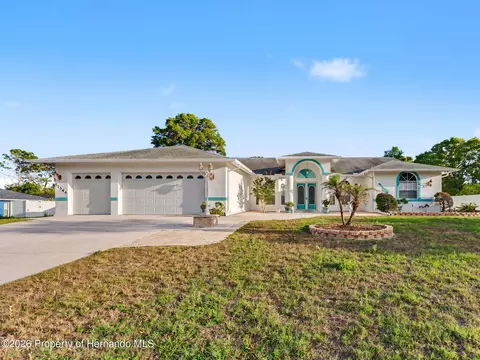 Exterior - 11344 Rainbow Woods Loop, Spring Hill, FL 34609 photo 4 of 25