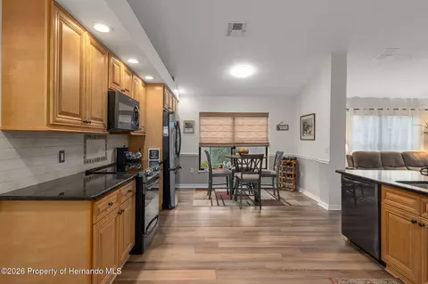 Kitchen - 11293 Copley Ct, Spring Hill, FL 34609 photo 5 of 6