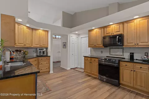 Kitchen - 11293 Copley Ct, Spring Hill, FL 34609 photo 4 of 6