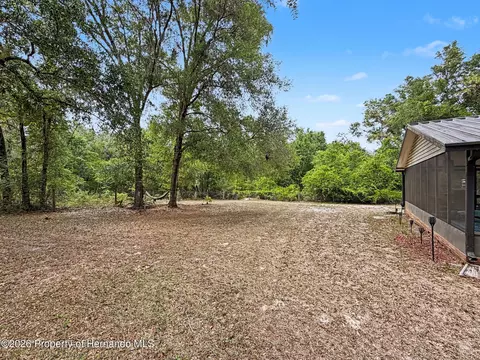 Exterior - 7111 Ricker Ave, Webster, FL 33597 photo 5 of 9