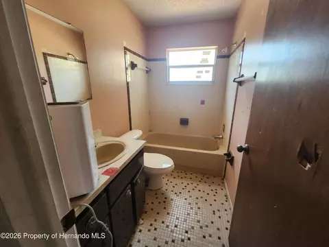 Bath - 2377 Giovanni Ave, Spring Hill, FL 34608 photo 2 of 2