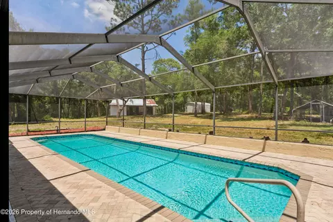 Exterior - 16225 Bonzai Trl, Spring Hill, FL 34613 photo 6 of 24