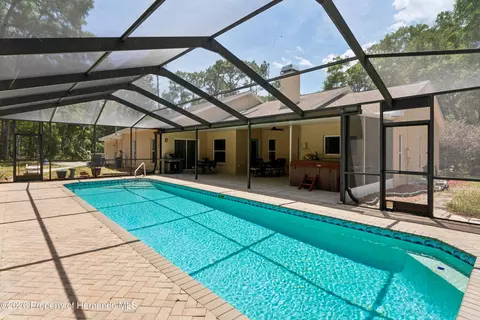 Exterior - 16225 Bonzai Trl, Spring Hill, FL 34613 photo 9 of 24