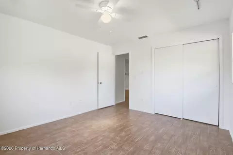 Bedroom - 8464 Delaware Dr, Weeki Wachee, FL 34607 photo 6 of 7