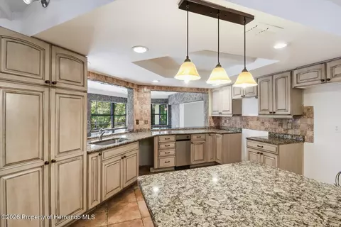 Kitchen - 8464 Delaware Dr, Weeki Wachee, FL 34607 photo 2 of 5