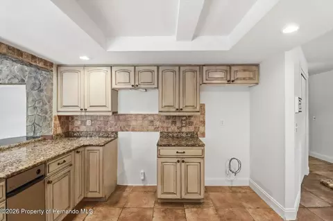 Kitchen - 8464 Delaware Dr, Weeki Wachee, FL 34607 photo 4 of 5